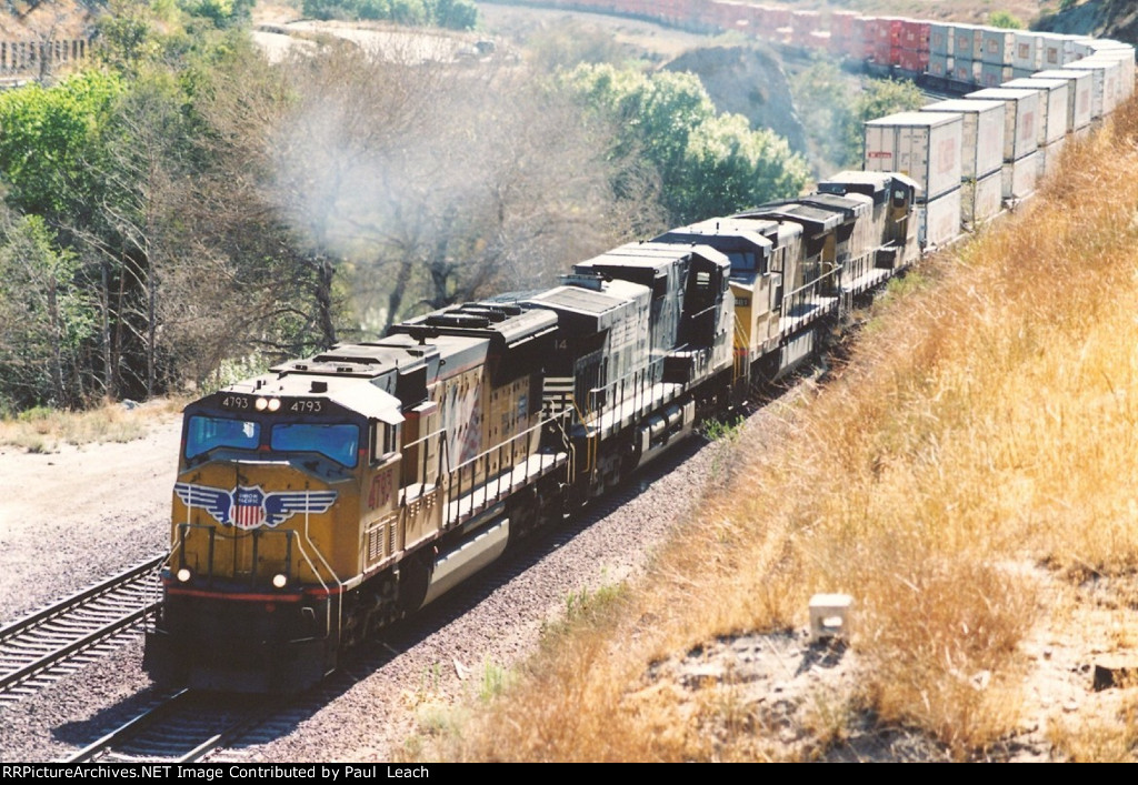 Eastbound stack train climbs upgrade